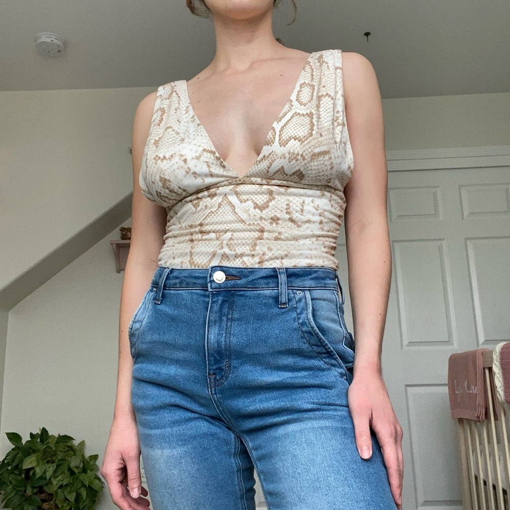 NWT low cut snakeskin print bodysuit